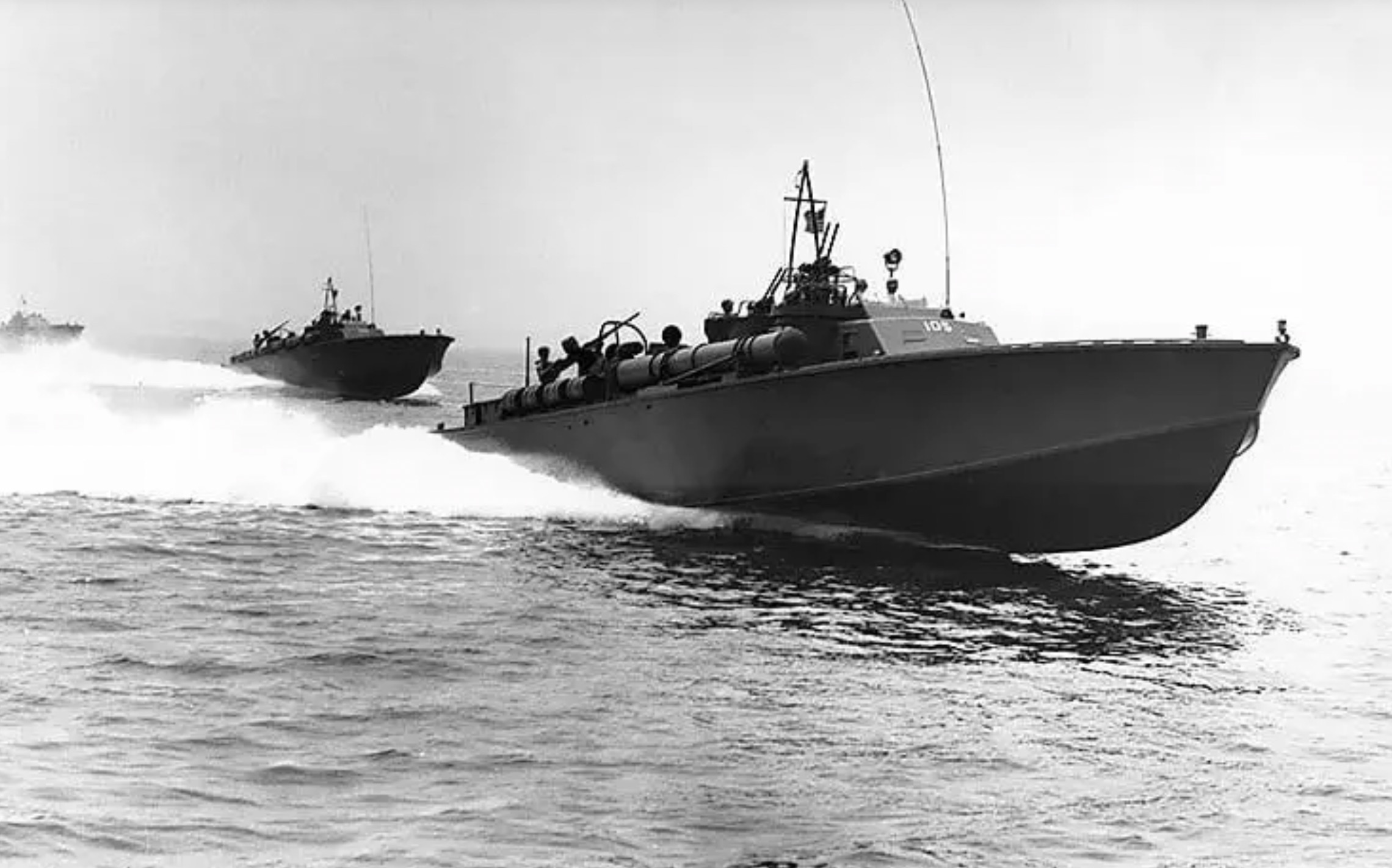 A PT boat running at high speed.